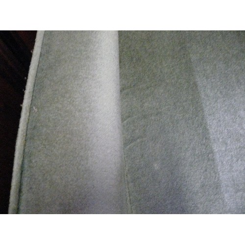 404 - A GREEN WING BACKED ARMCHAIR.