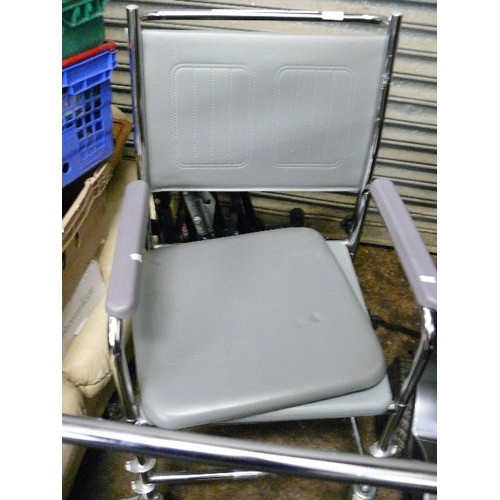 439 - A METAL FRAMED COMMODE WHEELCHAIR.