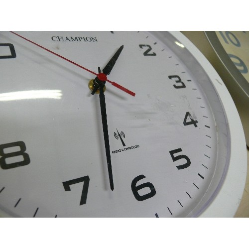 480 - TWO ROUND WALL CLOCKS MADE BY 'RADIO CONTROLLED'.