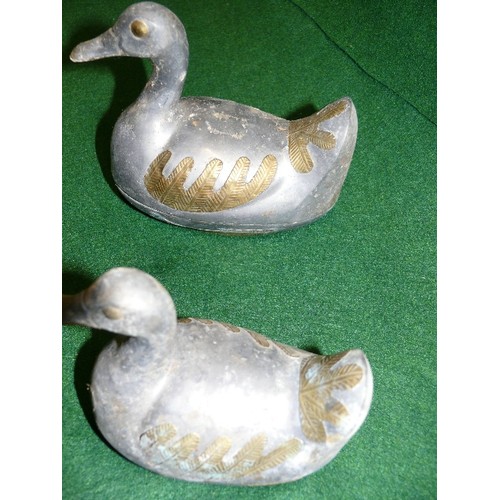 1 - TWO PEWTER AND BRASS DUCK TRINKET POTS, ONE LARGE AND ONE SMALLER.