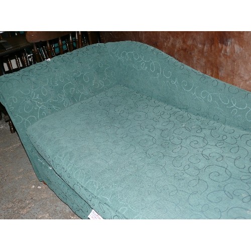 388 - A GREEN CHAISE LONGUE.