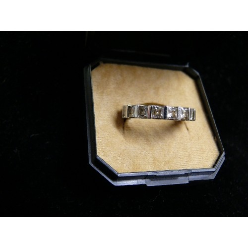 51 - BEAUTIFUL SILVER METAL ETERNITY RING WITH BAGUETTE CZ STONES SIZE Z AND ONE OTHER SIZE O/P.