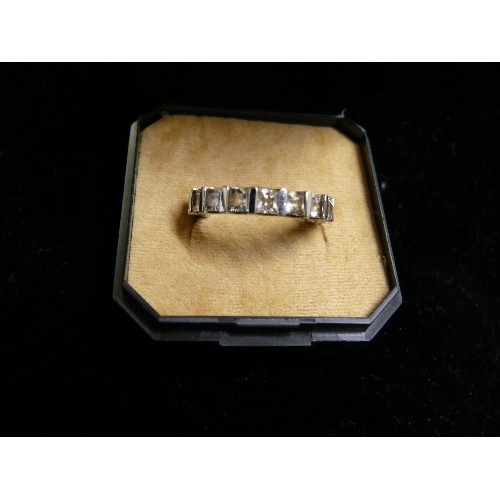 51 - BEAUTIFUL SILVER METAL ETERNITY RING WITH BAGUETTE CZ STONES SIZE Z AND ONE OTHER SIZE O/P.