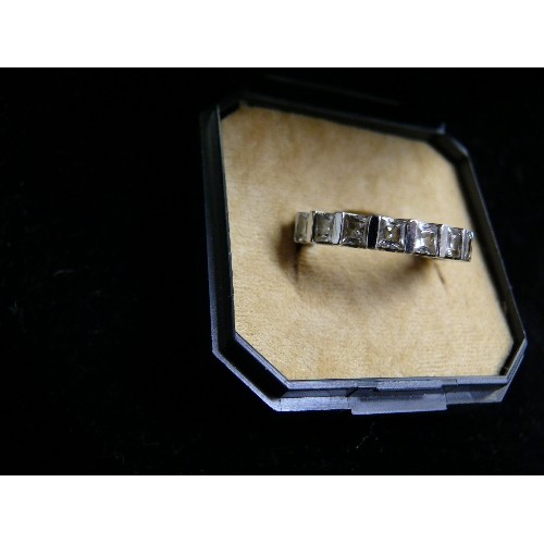 51 - BEAUTIFUL SILVER METAL ETERNITY RING WITH BAGUETTE CZ STONES SIZE Z AND ONE OTHER SIZE O/P.