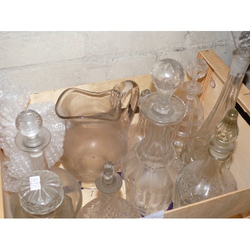 181 - A WOODEN CRATE CONTAINING VARIOUS GLASS DECANTERS, JUGS ETC.