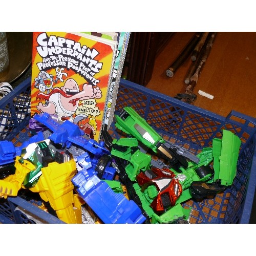 337 - A SELECTION OF TRANSFORMER TOYS AND CAPTAIN UNDERPANTS BOOKS.