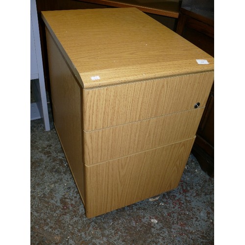 410 - A MODERN THREE DRAWER FILING CABINET.