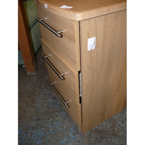 411 - A MODERN THREE DRAWER CABINET.