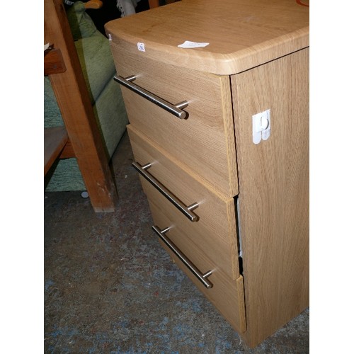 411 - A MODERN THREE DRAWER CABINET.