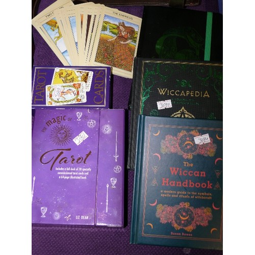 66 - A SELECTION OF BOOKS AND CARDS ABOUT WITCHES AND SIMILAR.