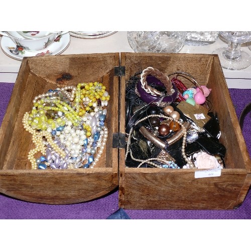 69 - WOODEN CHEST WITH CONTENTS OF A LARGE QUANTITY OF COSTUME JEWELLERY.