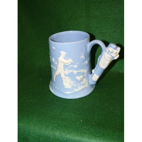 97 - A GOLF THEMED TANKARD BY DARTMOUTH POTTERY.