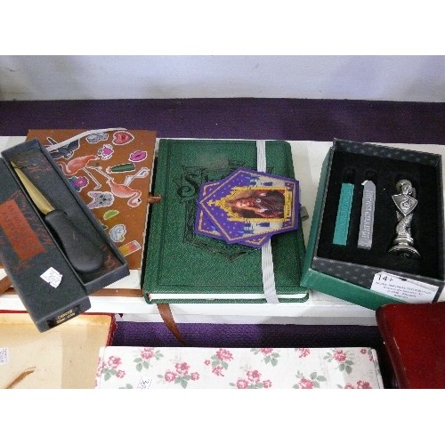 102 - A SELECTION OF HARRY POTTER THEMED ITEMS TO INCLUDE A SLYTHERIN NOTEBOK AND LETTER OPENER SET.