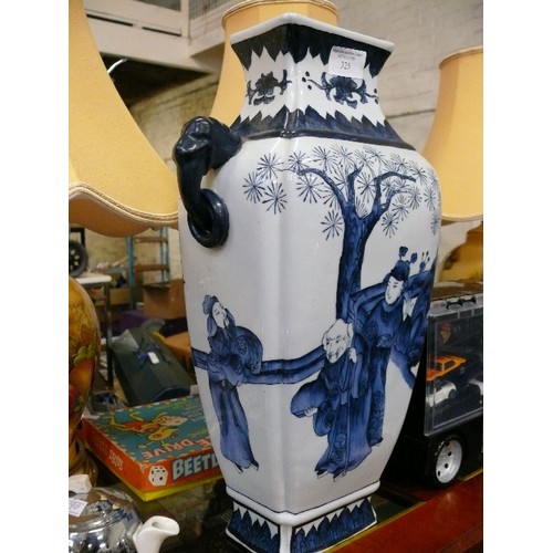 325 - A LARGE VERY HEAVY BLUE AND WHITE PORCELAIN JAPANESE VASE.