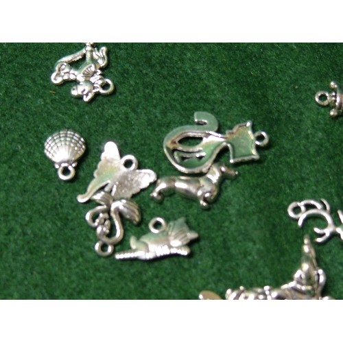 28 - QUANTITY OF SILVER METAL CHARMS.