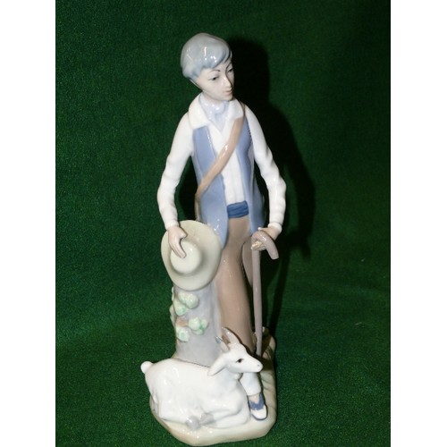 31 - PORCELAIN BOY WITH GOAT, BY CASADES.