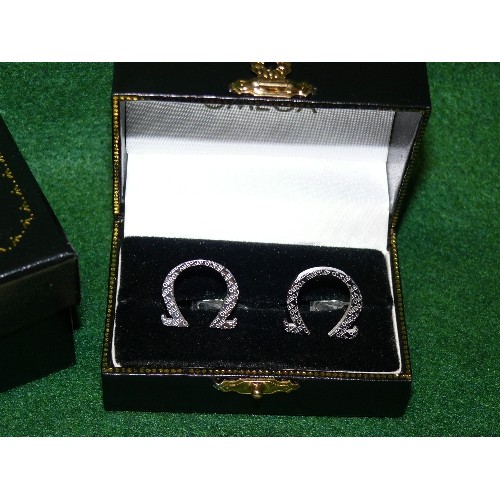 20 - PAIR OF OMEGA CUFFLINKS IN BOX WITH CERTIFICATE.