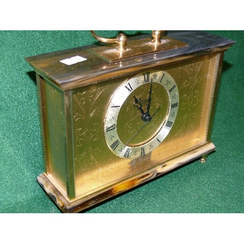 82 - A STAIGER BRASS MANTLE CLOCK.