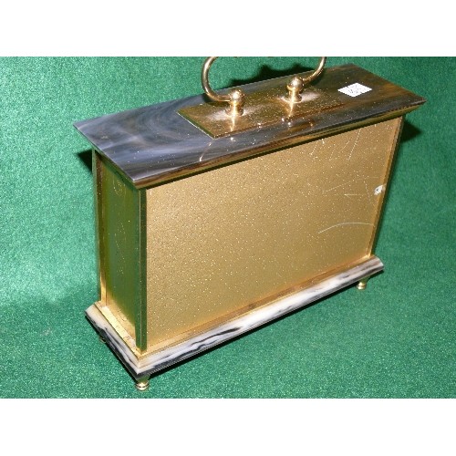 82 - A STAIGER BRASS MANTLE CLOCK.