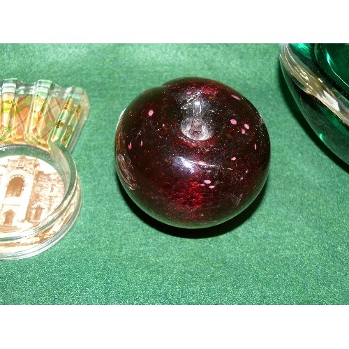 83 - A SELECTION OF COLOURED GLASS PAPERWEIGHTS.