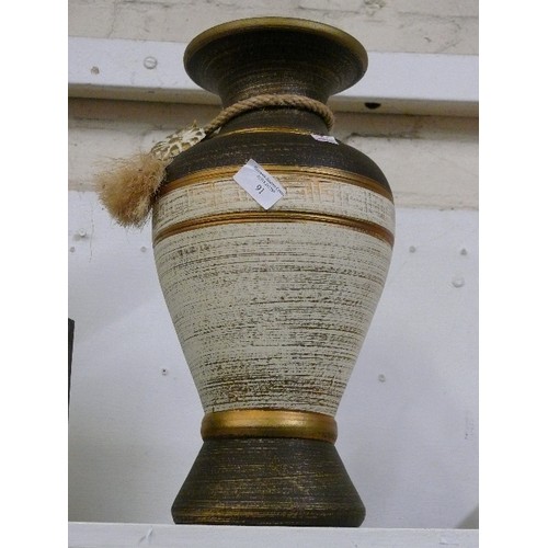 91 - A LARGE DECORATIVE VASE.