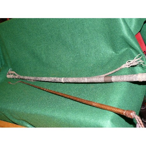 162 - A LARGE VINTAGE WHIP AND RIDING CANE.