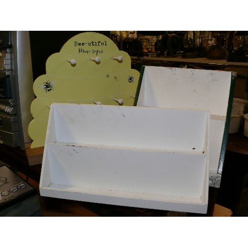 272 - FOUR FREE STANDING LETTER RACKS/ HOOKS.