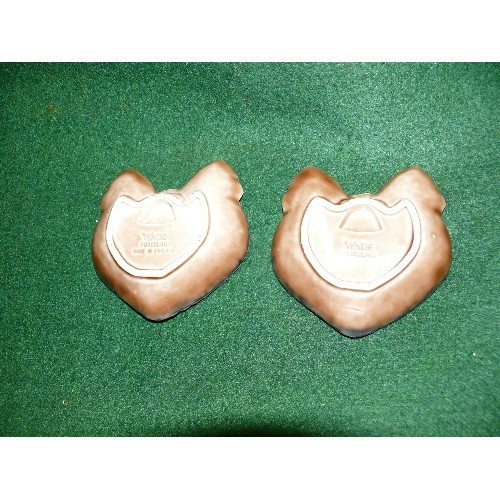 277 - A PAIR OF SMALL CAT FACE PIN DISHES BY WADE.