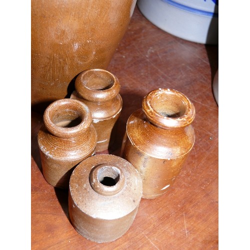 362A - FOUR VERY SMALL SALT GLAZED POTS AND A MATCHING JUG.