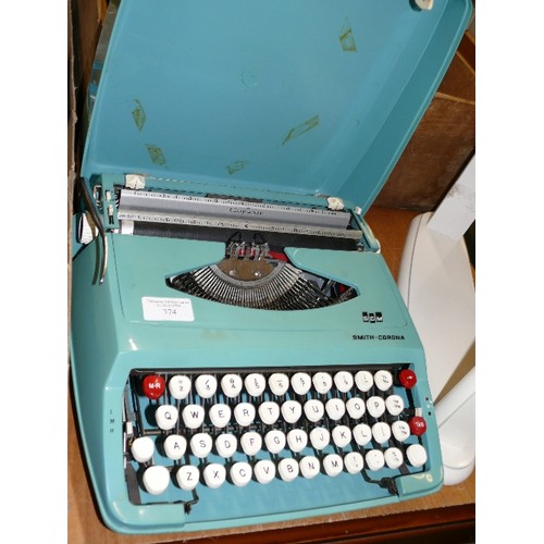 374 - SMITH-CORONA VINTAGE TYPEWRITER IN CASE.