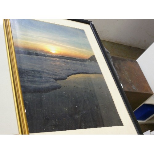 439 - THREE FRAMED AND GLAZED PRINTS, LILLIES, SUNSET AND SEASCAPE.