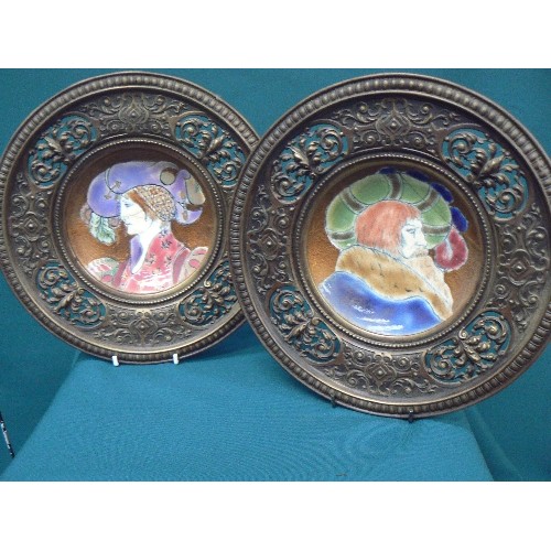 145 - Unusual pair of 19th Century Continental enamelled earthenware plates decorated with heads of noblem... 