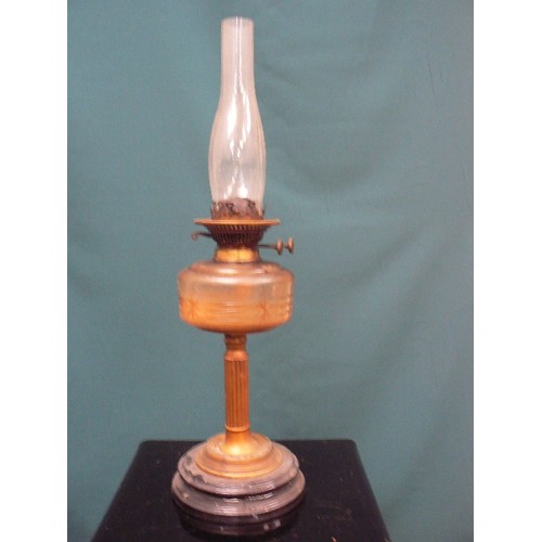 319A - A Victorian oil lamp with cut glass font and with chimney, the brass  burner marked 