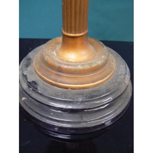 319A - A Victorian oil lamp with cut glass font and with chimney, the brass  burner marked 