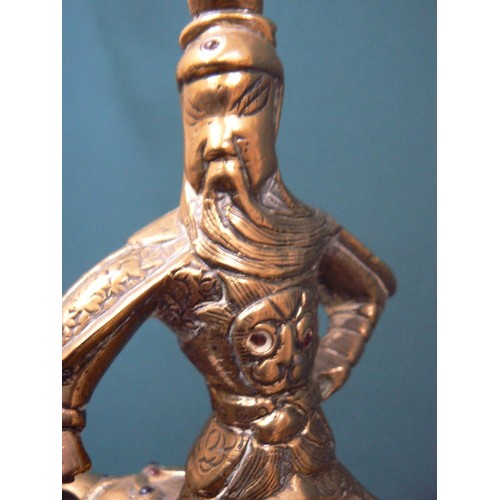 219 - Vintage solid brass warrior figure, possibly Genghis Khan on horseback, inlaid with coloured stones.... 