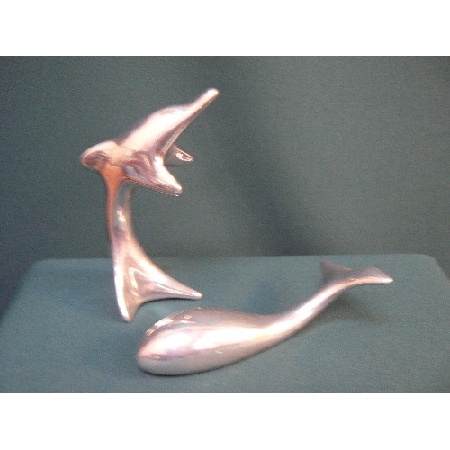 137 - Two signed Hoselton of Canada polished aluminium sculptures, whale and dolphin , models 1290 & 1782