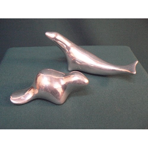 137A - Two signed Hoselton of Canada polished aluminium sculptures, beaver (955) and seal (125)