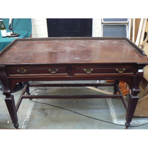 384 - Late Victorian mahogany desk, the top with upstand and two drawers, original brass handles and origi... 