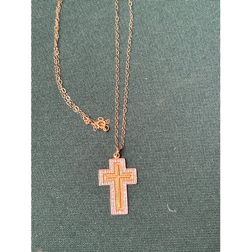 36 - A 9ct white & yellow gold cross pendant, the four arms set with a diamond, the back with the Lord's ... 