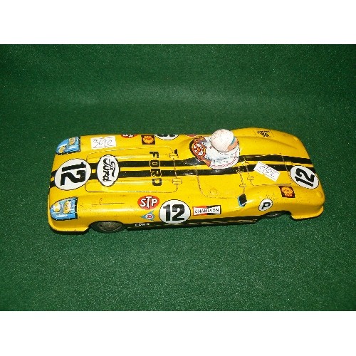 62 - A VINTAGE TIN PLATE FORD RACING CAR