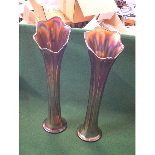 66 - A PAIR OF LARGE CARNIVAL GLASS VASES (ONE HAS A CHIP TO BASE).