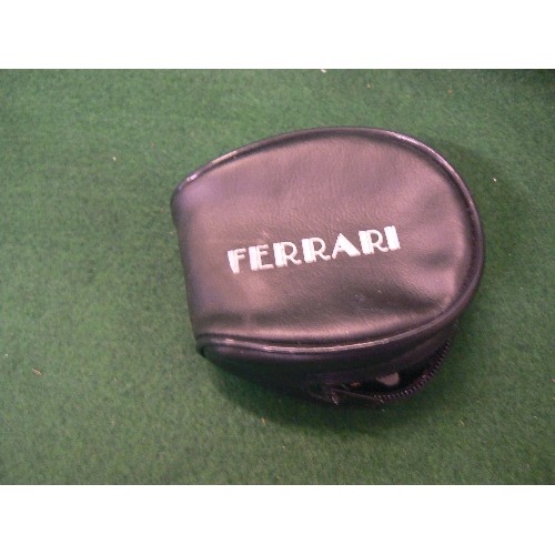 83 - A PAIR OF FOLDABLE FERRARI SUNGLASSES IN ORIGINAL CASE (scratches on one lens).