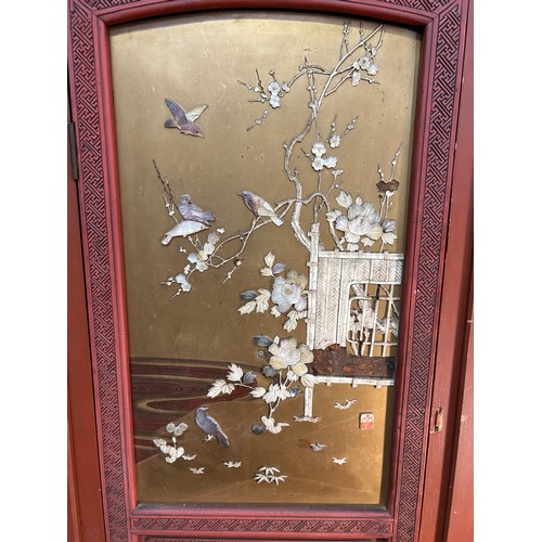 347A - An unusual 1920's Japanese corner cupboard with lacquered panel to the front depicting birds in a la... 