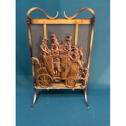 327B - A circa 1930's metal fire screen with a heavy cast metal panel of a coaching scene - probably a scen... 