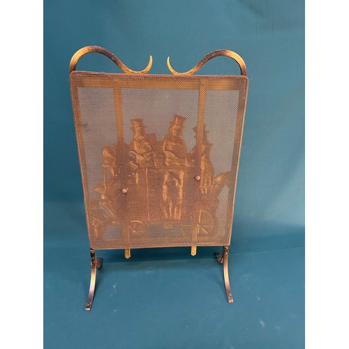 327B - A circa 1930's metal fire screen with a heavy cast metal panel of a coaching scene - probably a scen... 