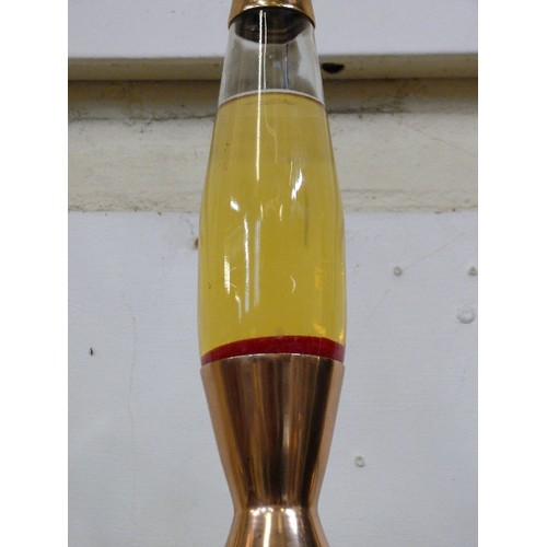 97 - A LARGE COPPER COLOURED LAVA LAMP