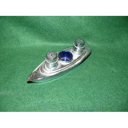 105 - A SILVER PLATE BOAT CRUET SET WITH ORIGINAL BLUE GLASS LINER.