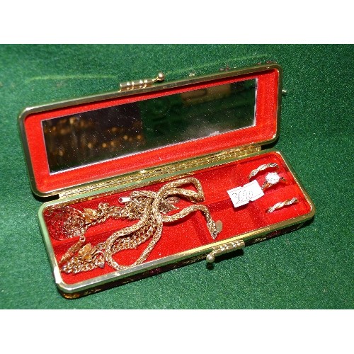 72 - A SMALL DECORATIVE JEWELLERY CASE WITH CONTENTS OF GOLD COLOURED JEWELLERY.