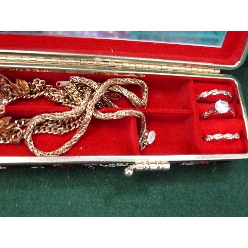 72 - A SMALL DECORATIVE JEWELLERY CASE WITH CONTENTS OF GOLD COLOURED JEWELLERY.