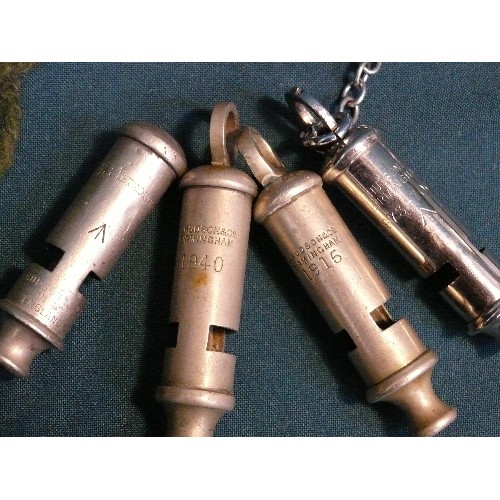 220A - Collection of 5 military whistles including J Hudson & Co dated 1915, J Hudson with broad arrow mark... 